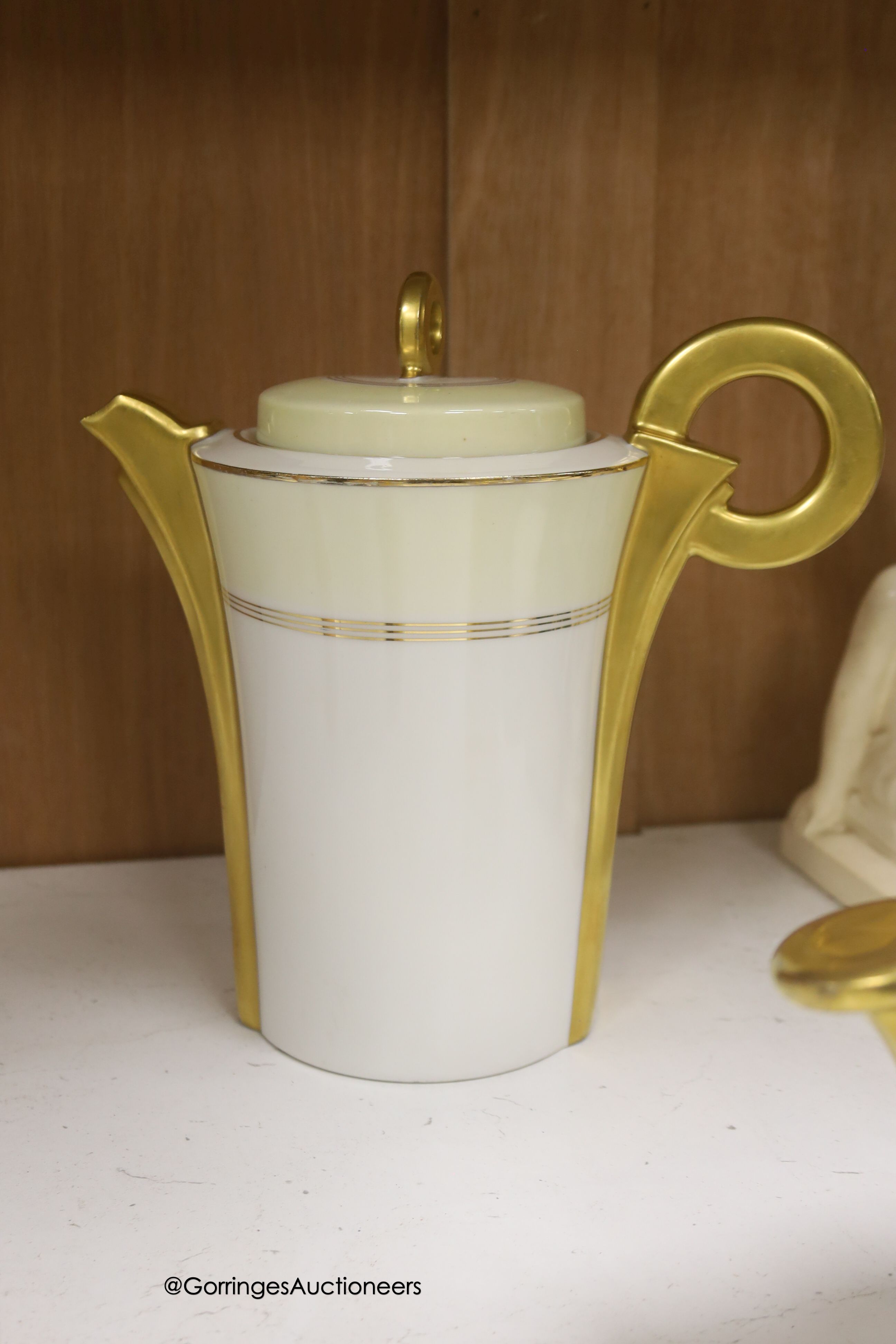A Carter, Stabler & Adams Poole square serving dish, with cover, width 13cm, a pair of white glazed earthenware nude bookends, a Limoges teaset and three other items